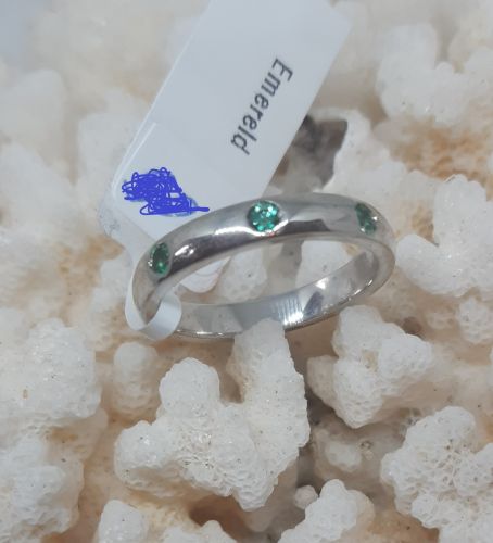 Silver ring with emerald